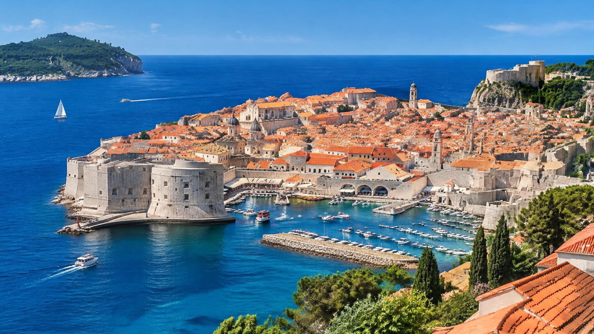 Old town of Dubrovnik with red roofs by the Adriatic Sea